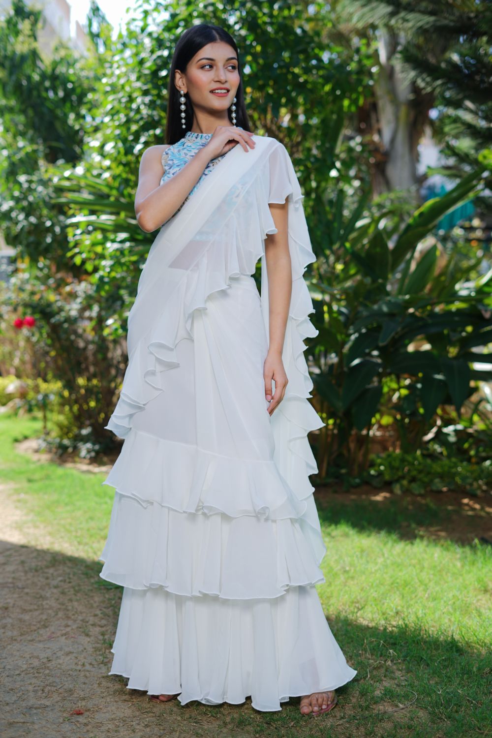 White golden ruffle saree with unstitched blouse